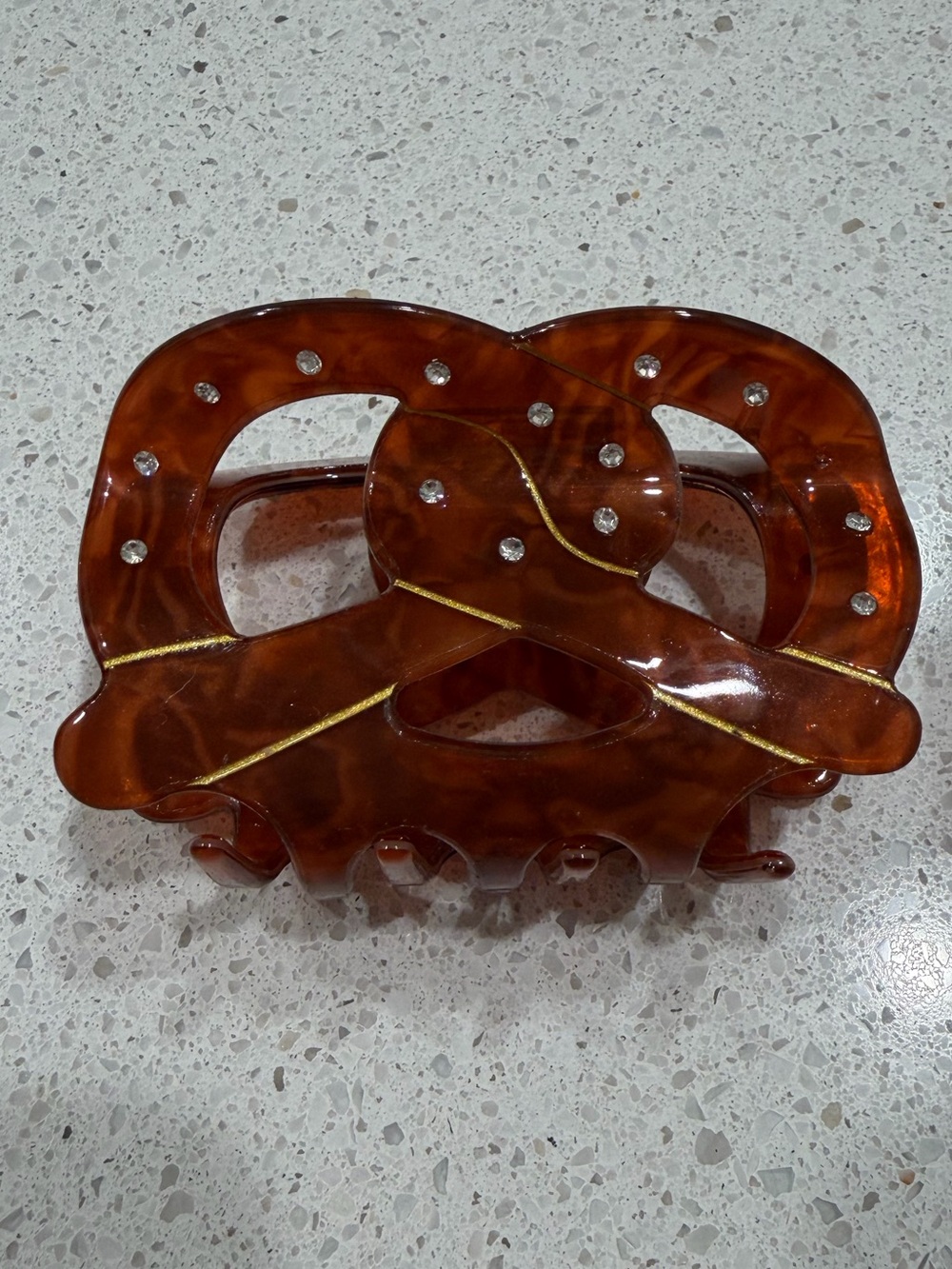 Rhinestone “salted” Tortoiseshell Brown pretzel with gold hair claw clip 🥨